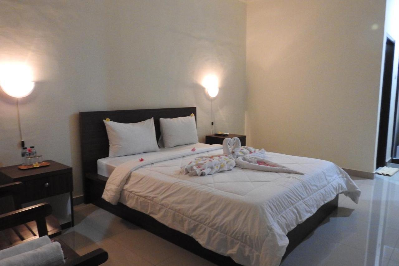 D'Batur Hotel Сенггиги Экстерьер фото