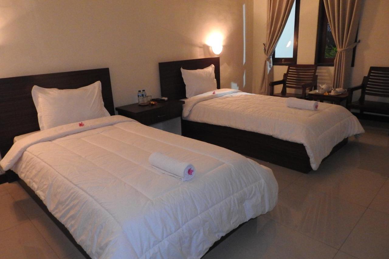 D'Batur Hotel Сенггиги Экстерьер фото