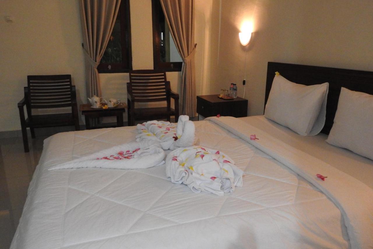 D'Batur Hotel Сенггиги Экстерьер фото
