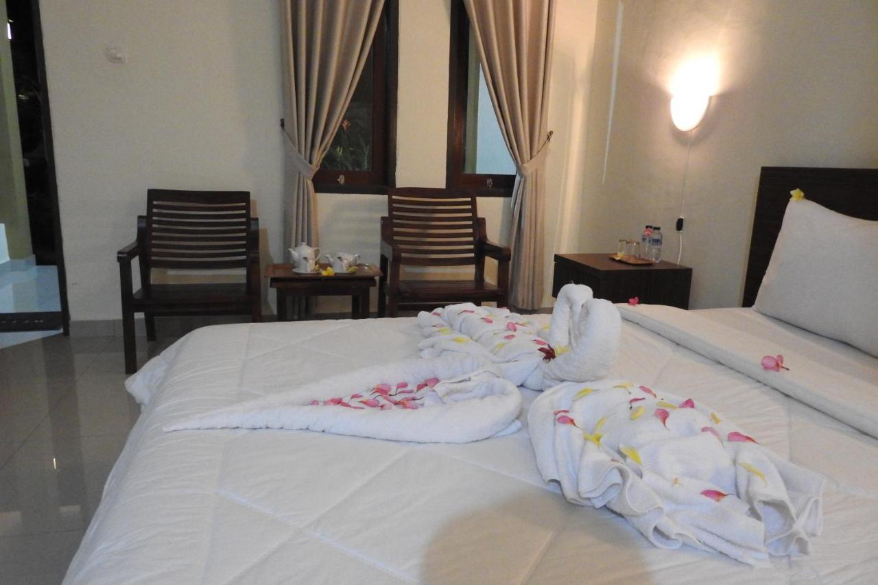 D'Batur Hotel Сенггиги Экстерьер фото
