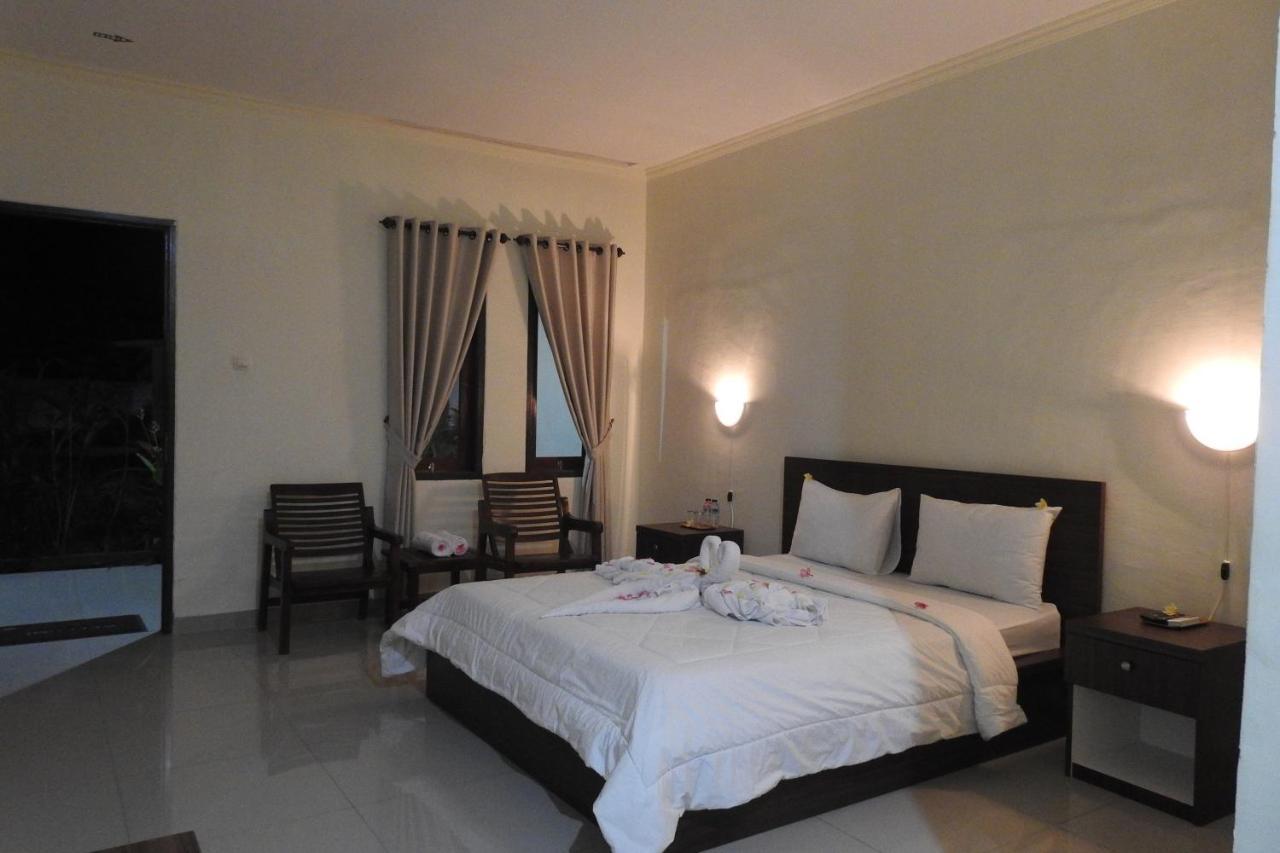 D'Batur Hotel Сенггиги Экстерьер фото