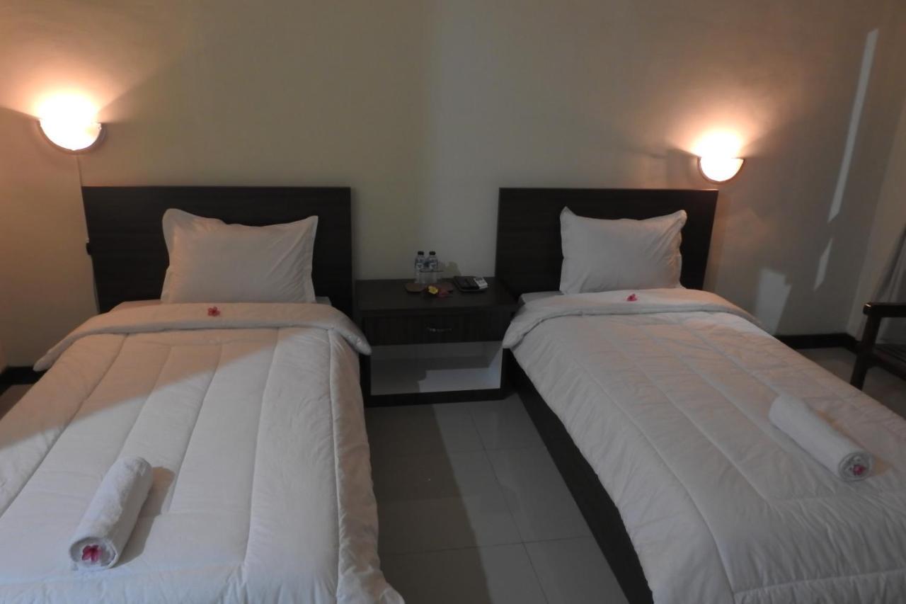 D'Batur Hotel Сенггиги Экстерьер фото