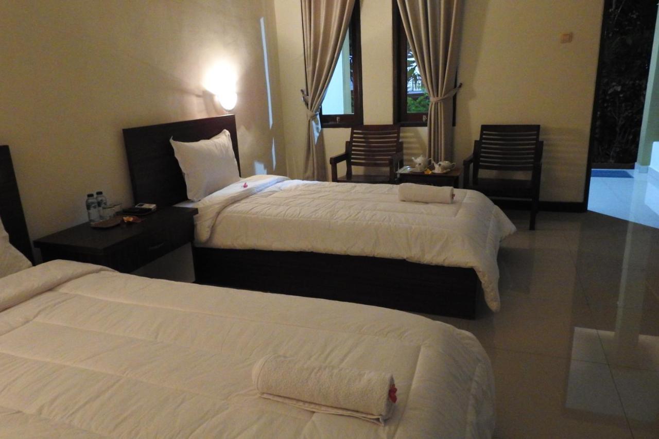 D'Batur Hotel Сенггиги Экстерьер фото