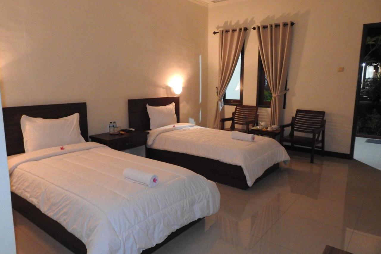 D'Batur Hotel Сенггиги Экстерьер фото