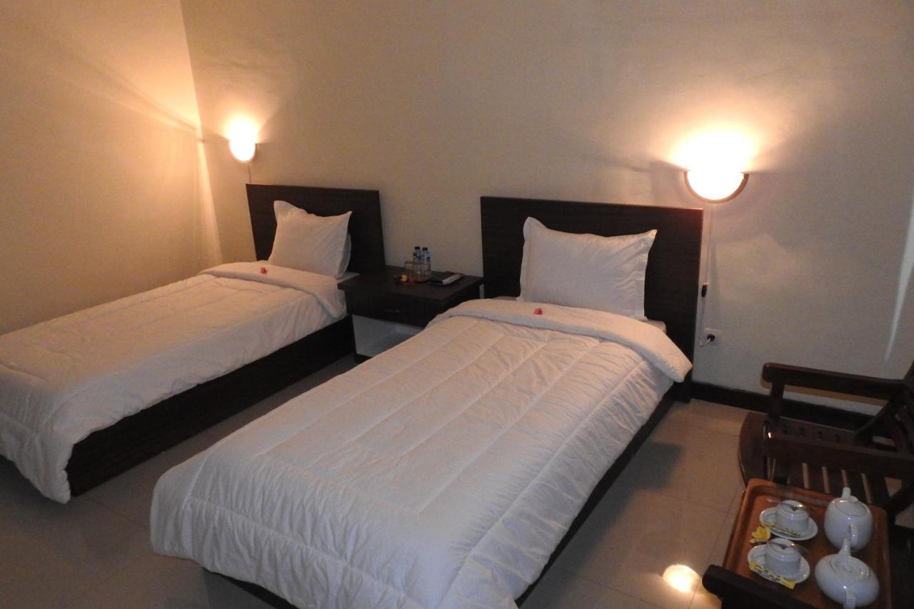 D'Batur Hotel Сенггиги Экстерьер фото