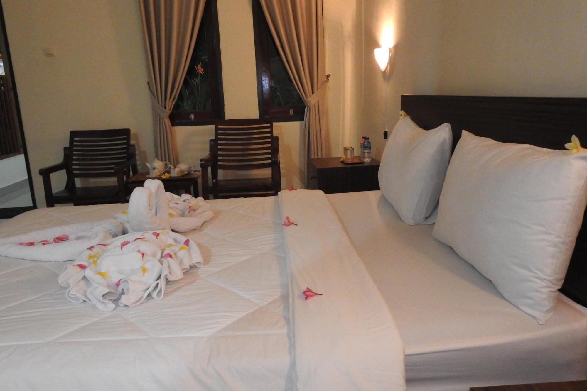 D'Batur Hotel Сенггиги Номер фото
