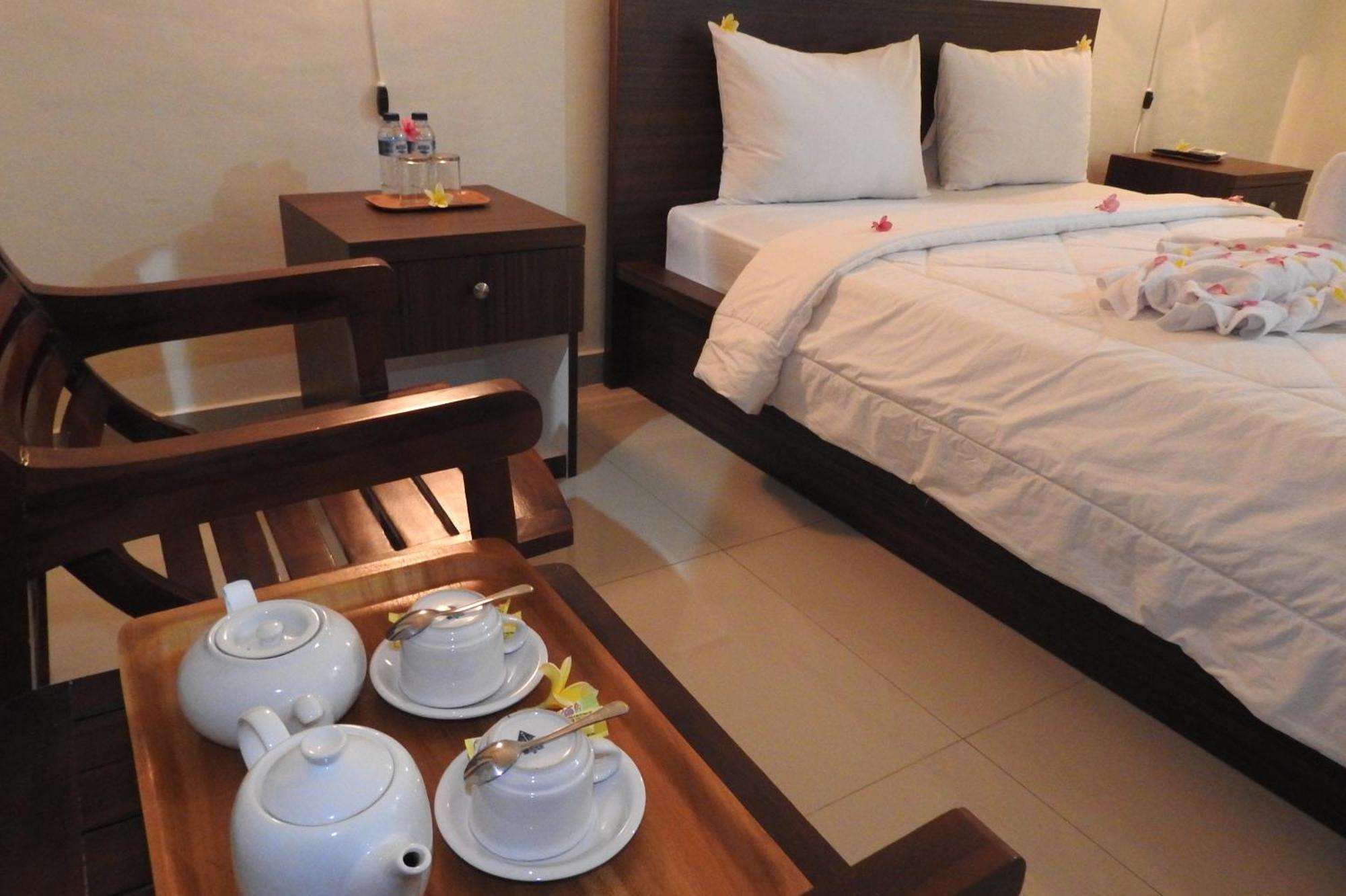 D'Batur Hotel Сенггиги Номер фото